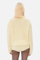 Model in Emi sweater back view