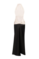 Two-tone dress with a white top and black skirt on a white background, back view