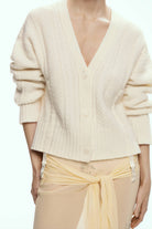 Ivory Josie cardigan worn by a person on a white background