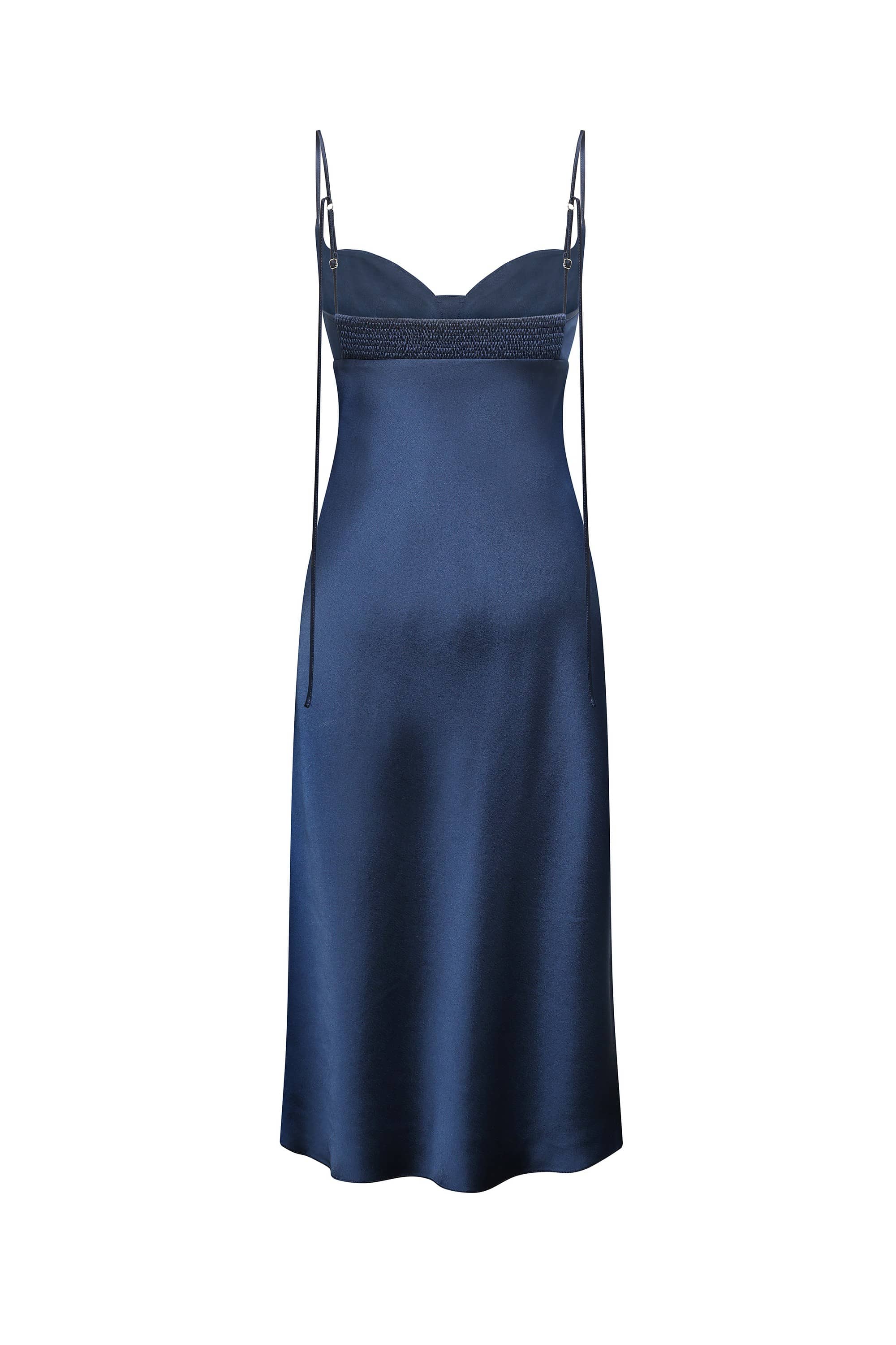 A navy blue satin slip Leona dress with thin spaghetti straps and a sweetheart neckline, shown against a plain white background, back view