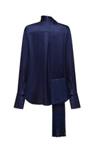A dark navy blue long-sleeve Lydia blouse with a high mock neck, draped front panels, and a matching fringed scarf hanging from the waist, shown against a plain white background, back view