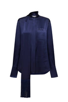 A dark navy blue long-sleeve silk Lydia blouse with a high mock neck, front button placket, chest pocket, and a long matching fringed scarf draped over the front, shown on a plain white background