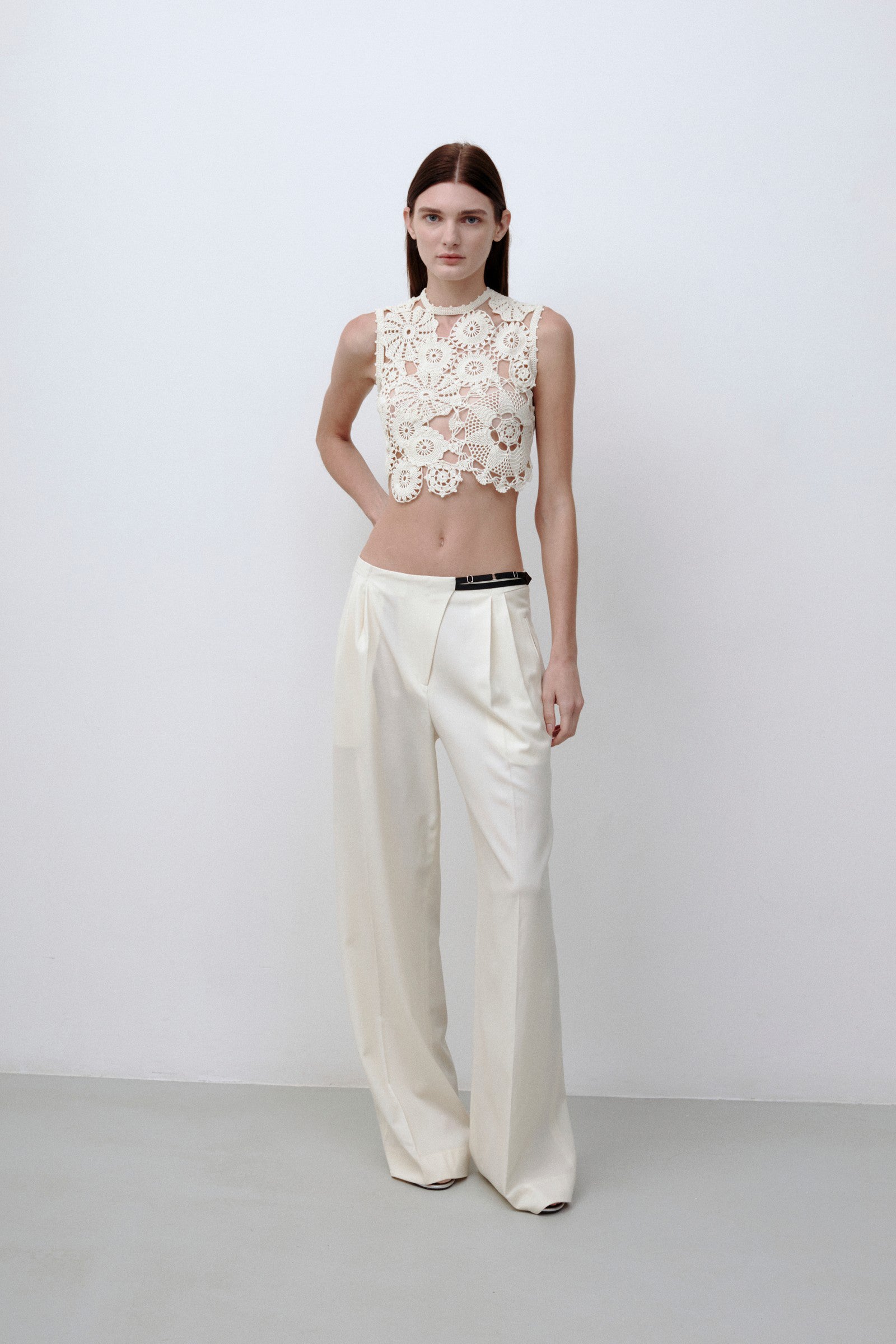 Model in ivory Noemie pants