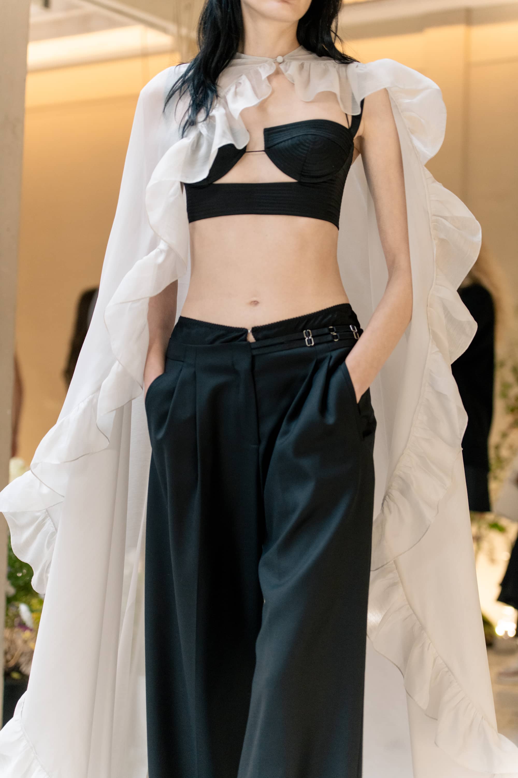 Model in Bernadette grey cape front view