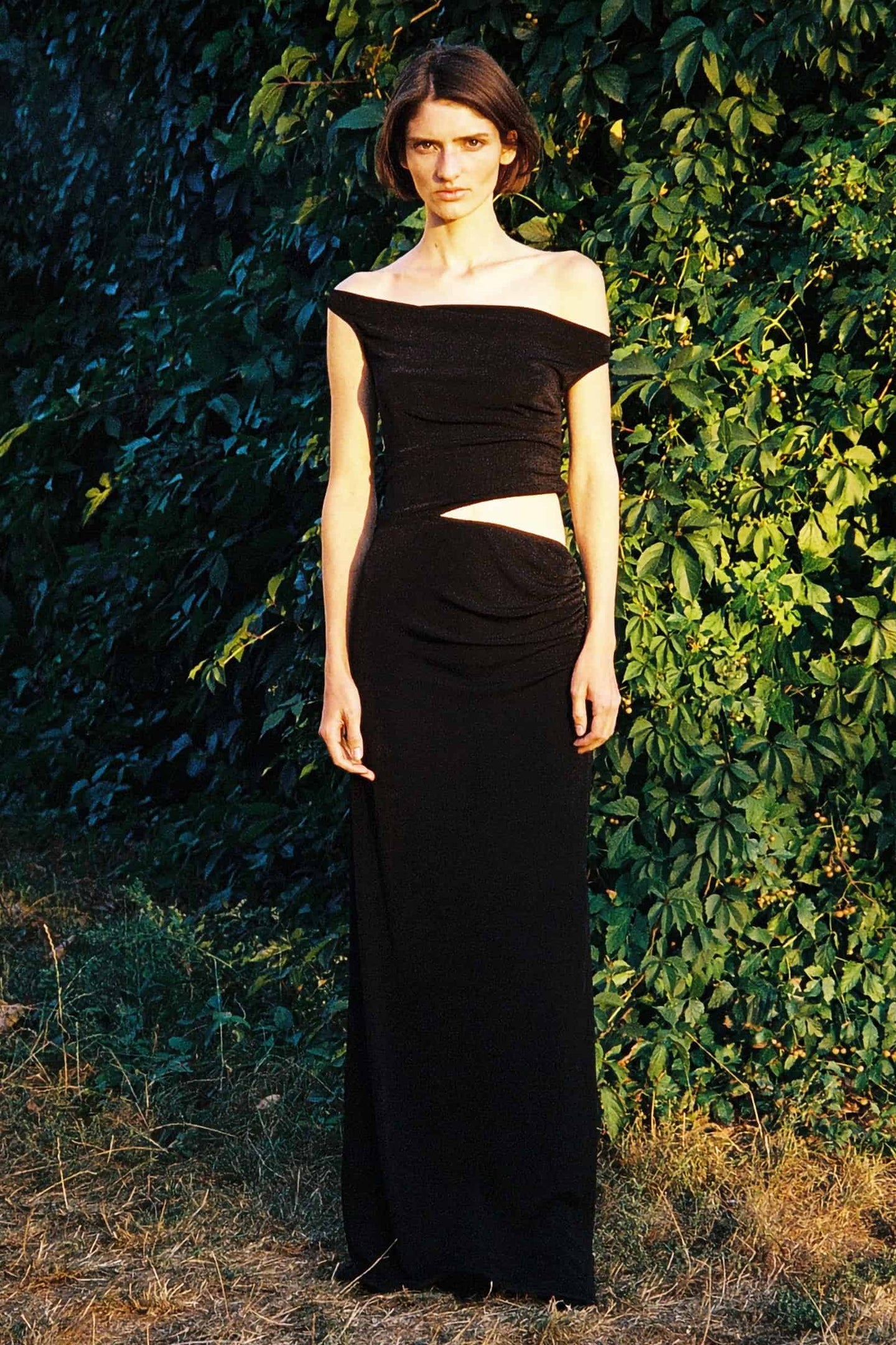 Model in black Willow dress