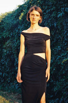 Model in black Willow dress