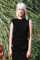 Model in black Florence top