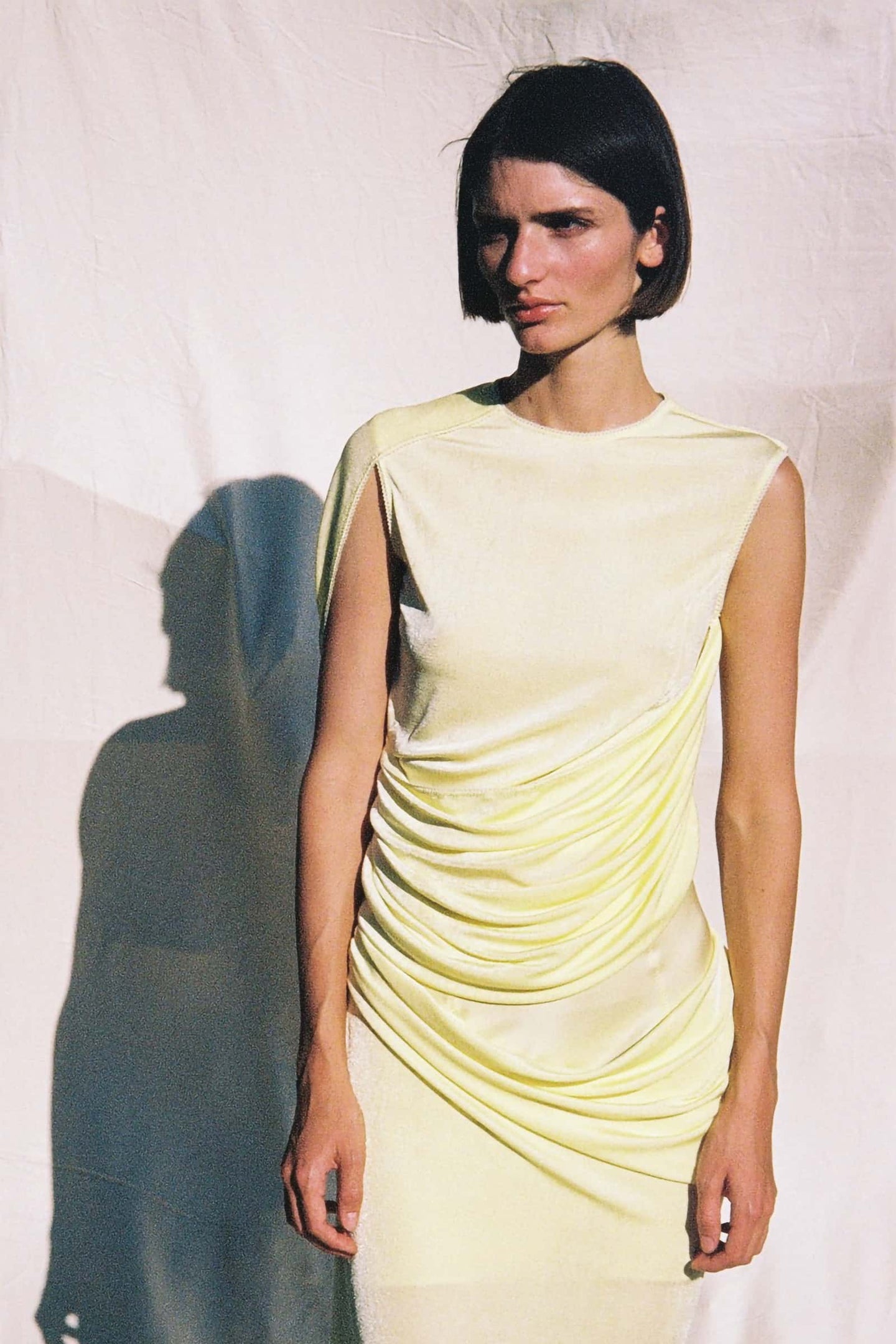 Model in lemon yellow Florence top