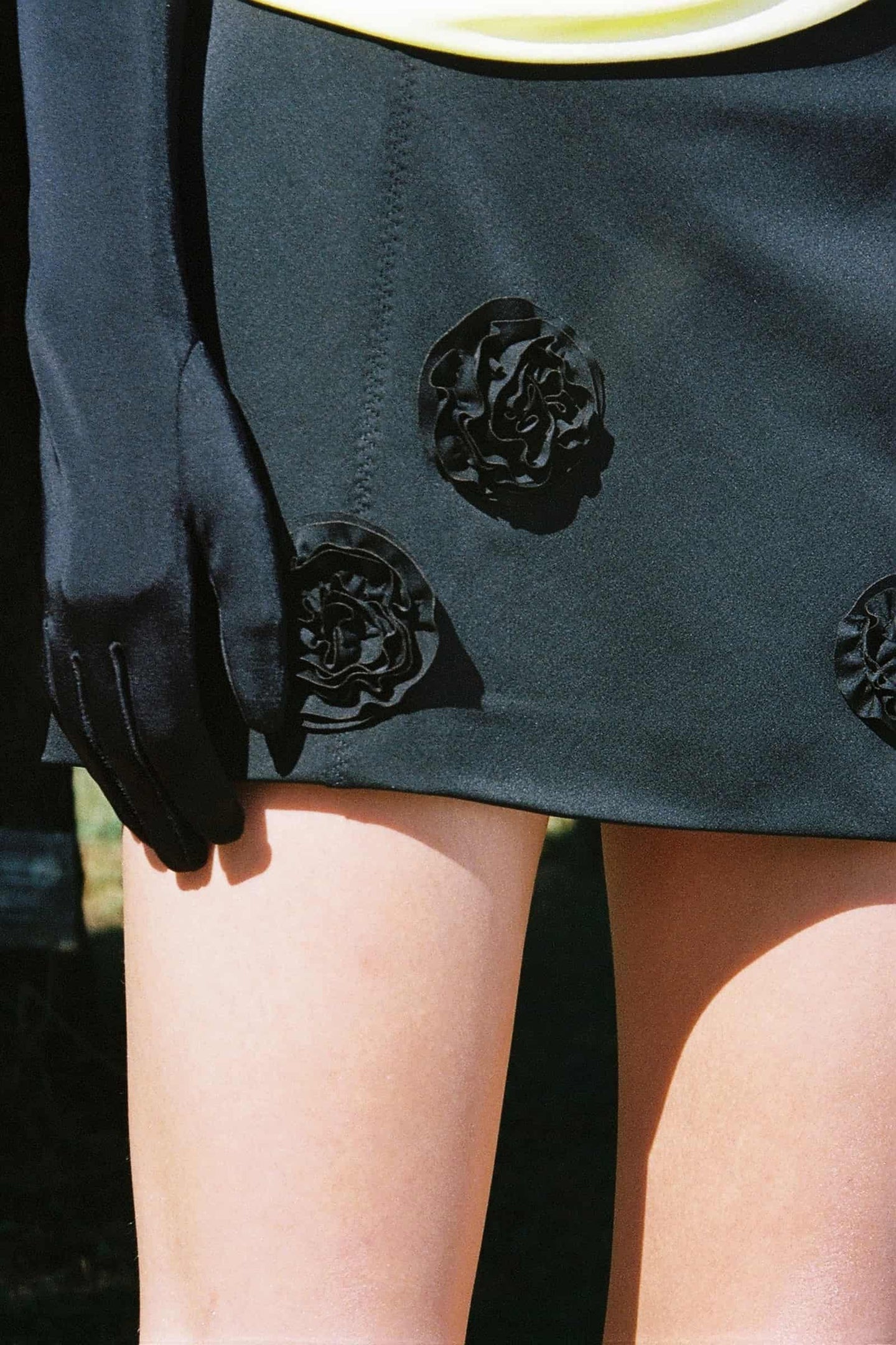 Model in black Rosy skirt detail