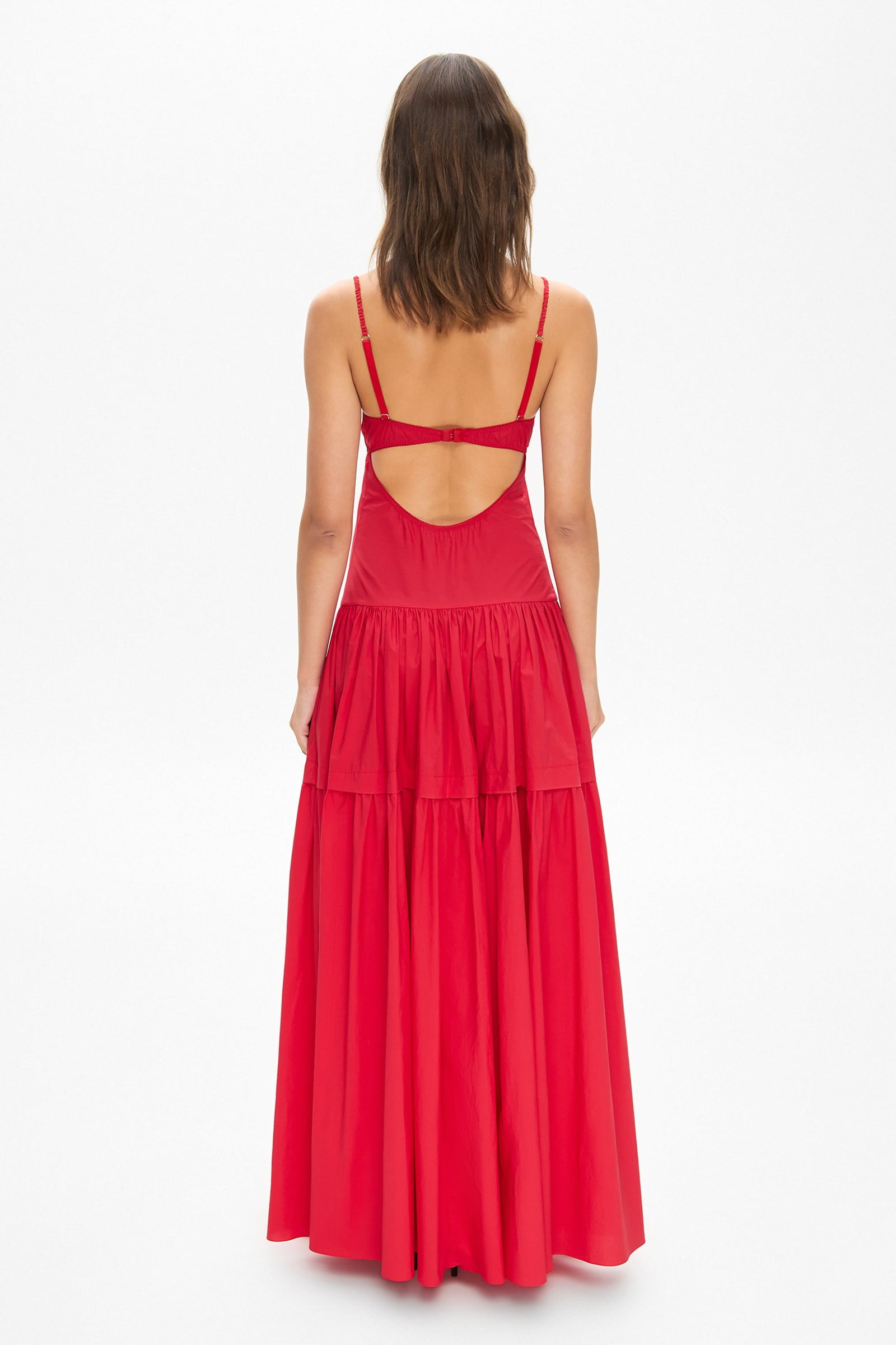 Model in bustier style bodice maxi Yulitta dress with a wide skirt back view