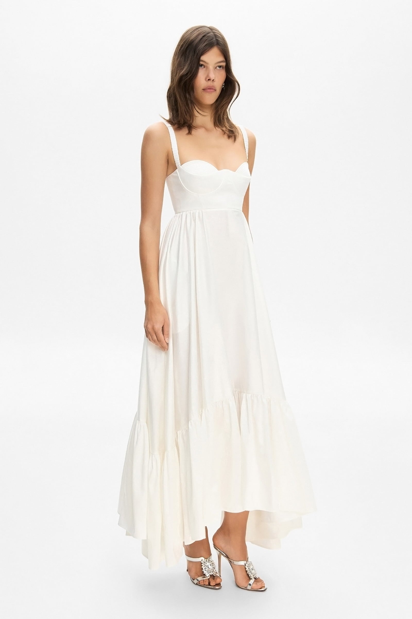 Model in A-silhouette Swan maxi dress with cups side view