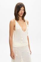 Model in Silhouette knitted Lula top with straps handmade side view
