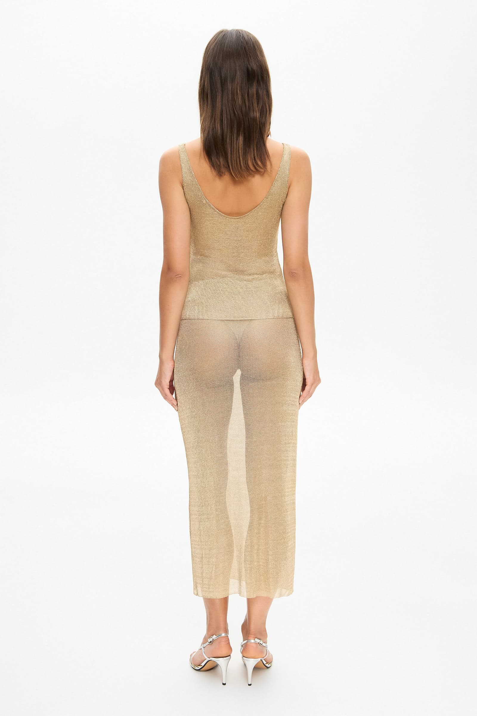 Model in Roxanne midi straight skirt back view