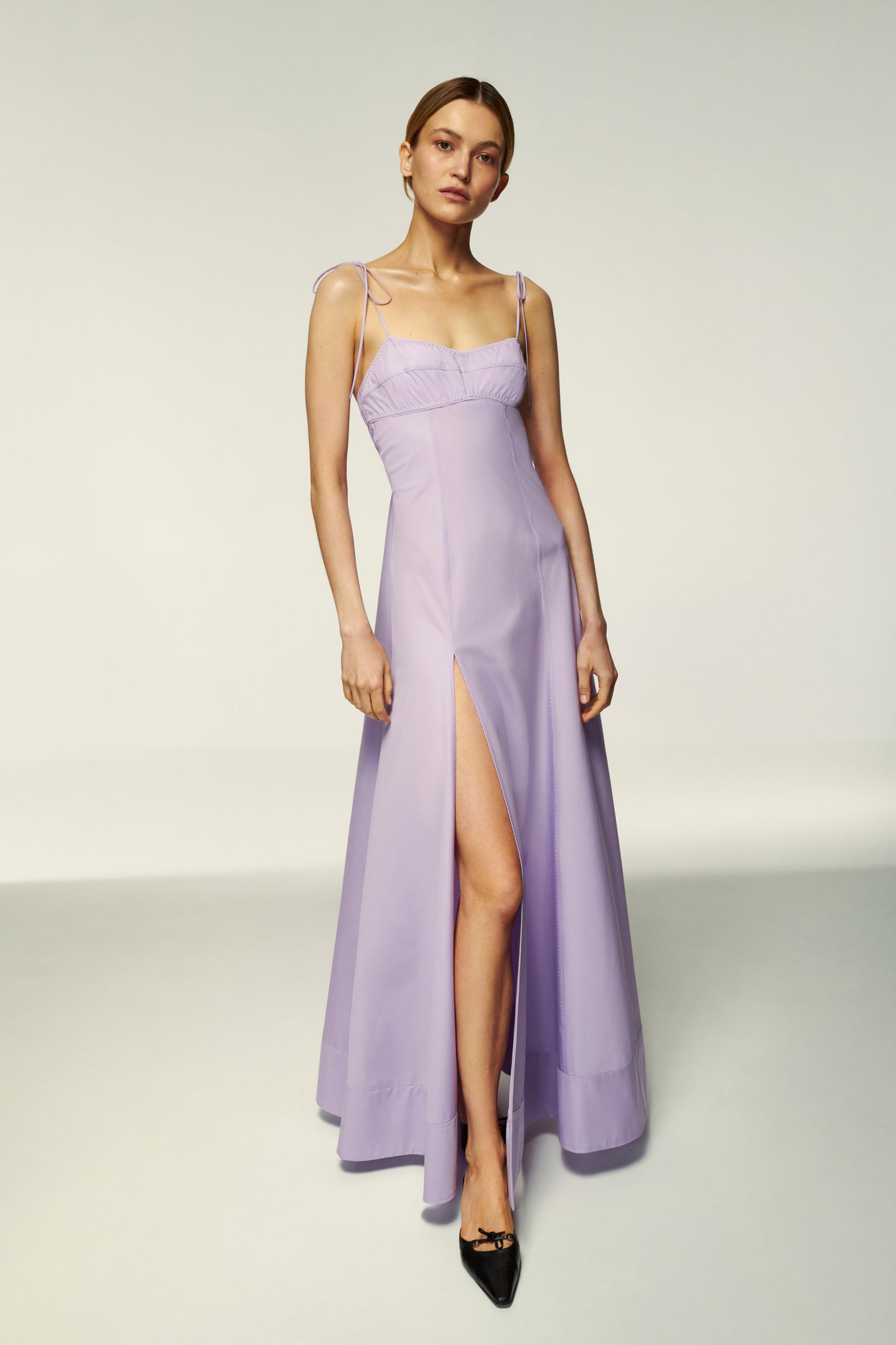 Model in lavender Libertine dress