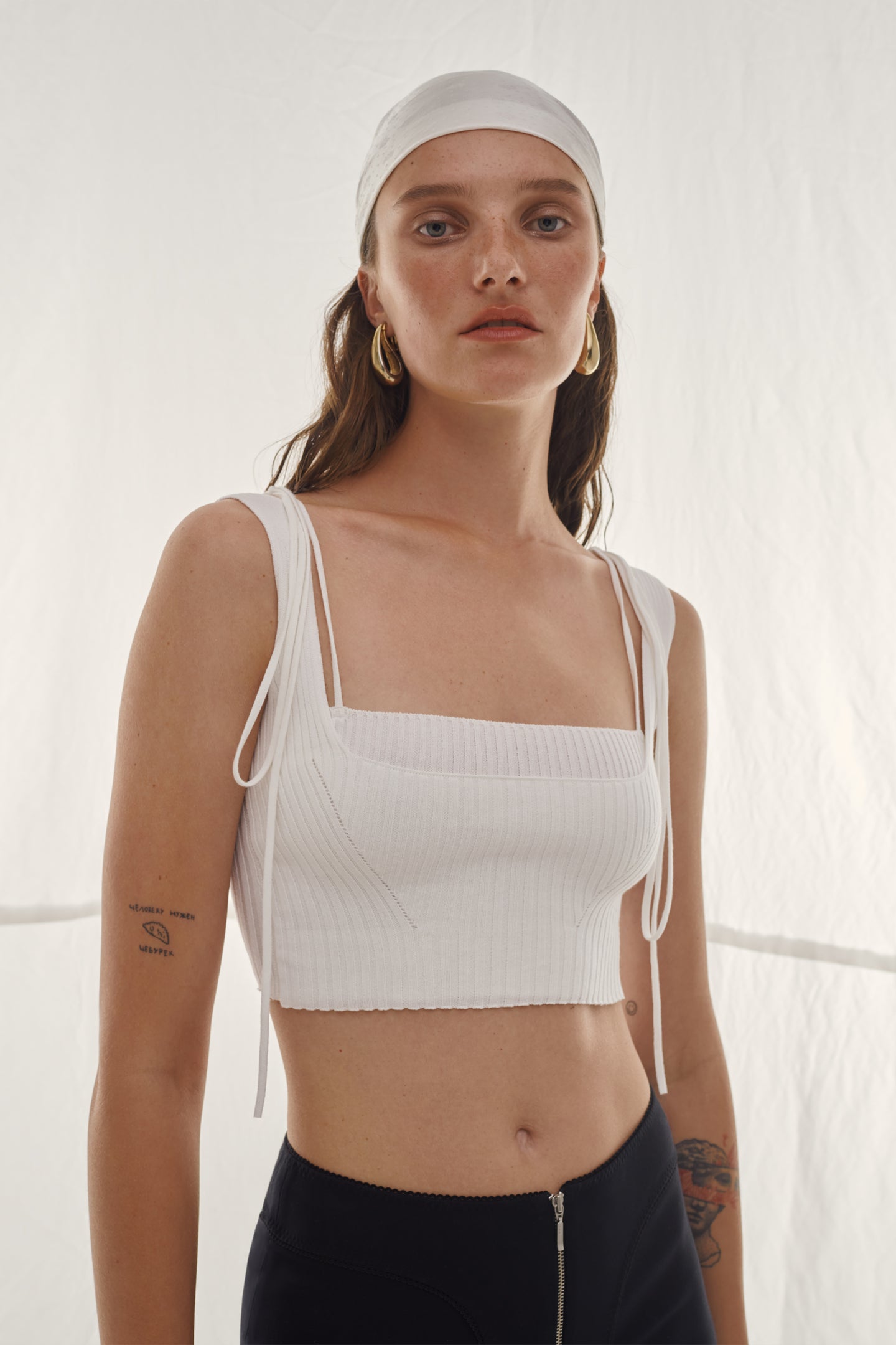 Model in white Arta top