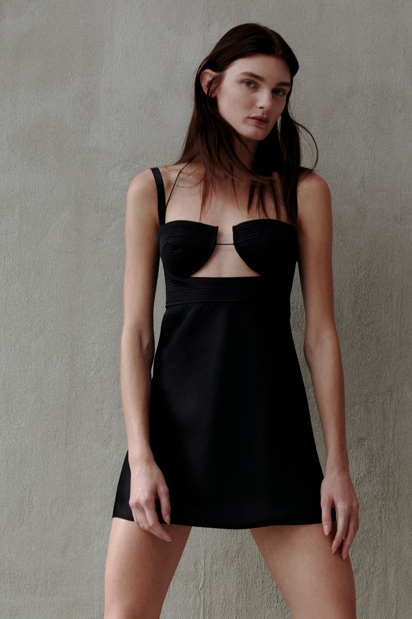 Model in black Lila dress