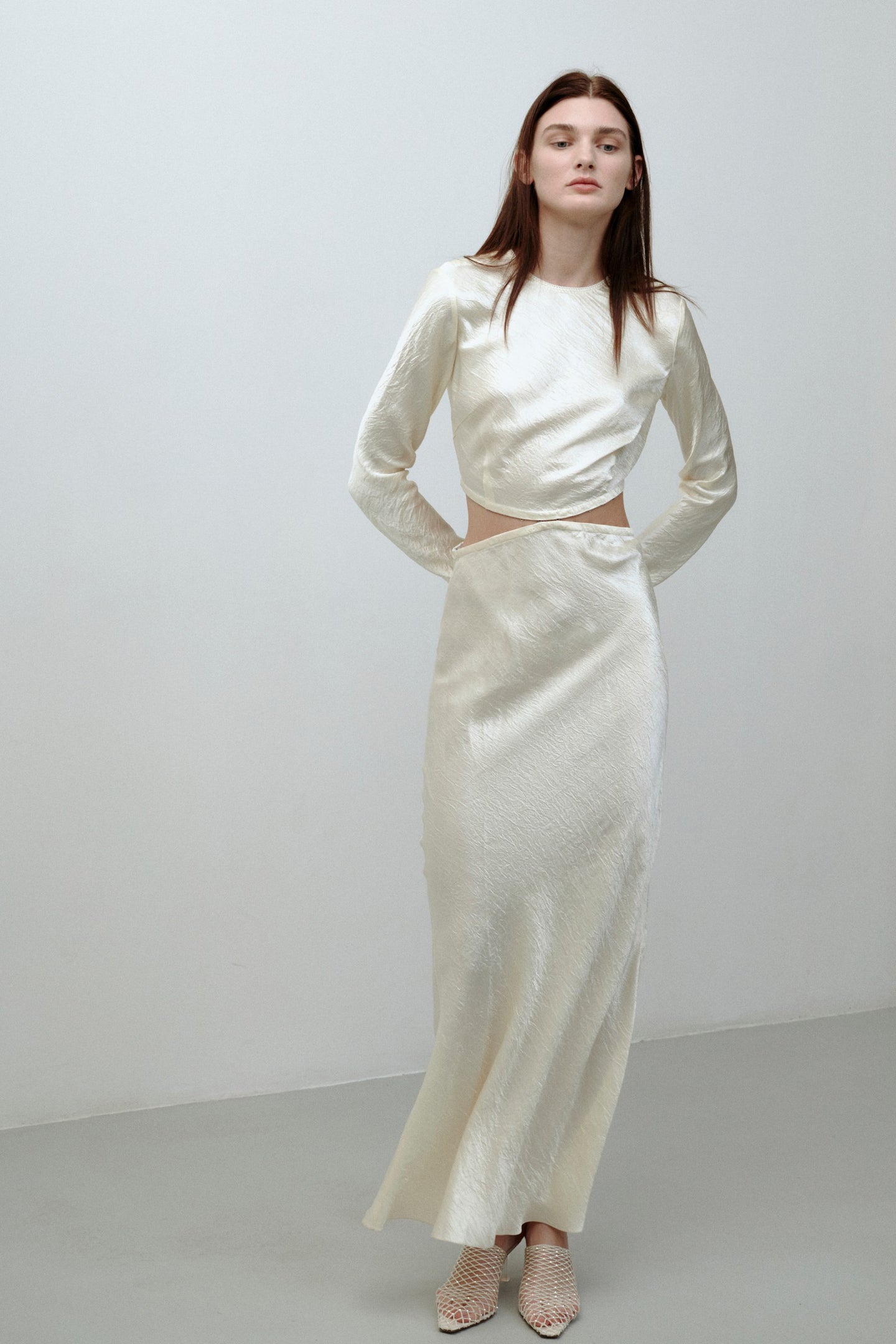 Model in ivory Martha dress