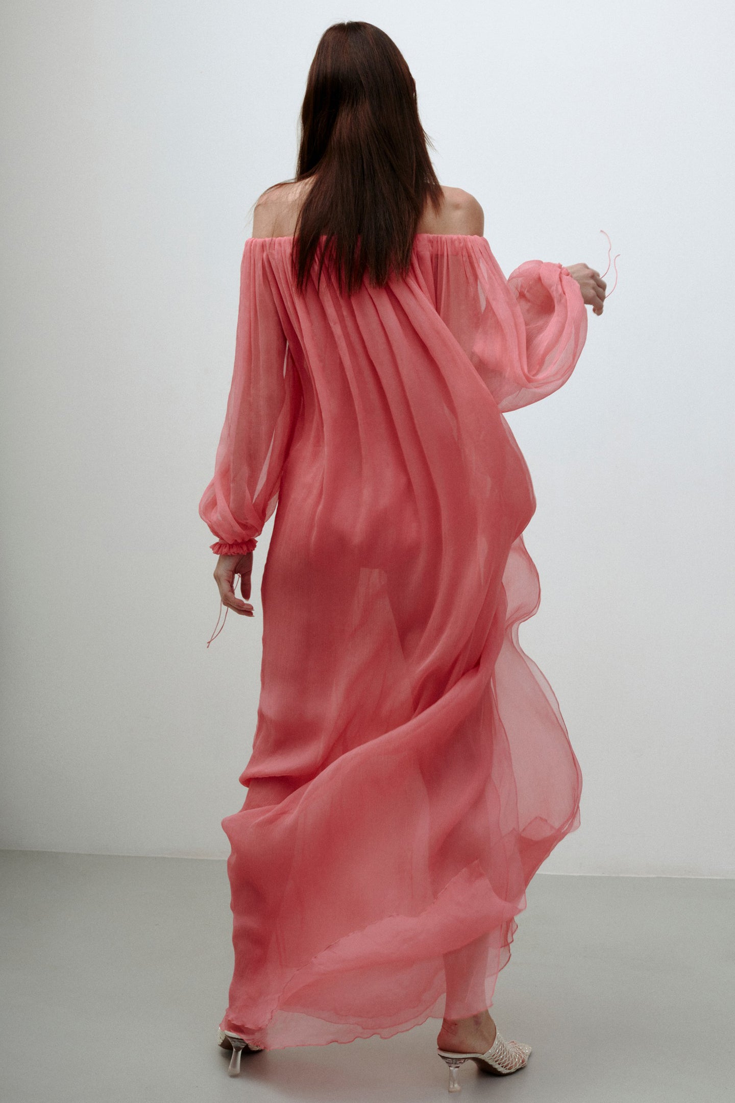 Model in pink Milani dress