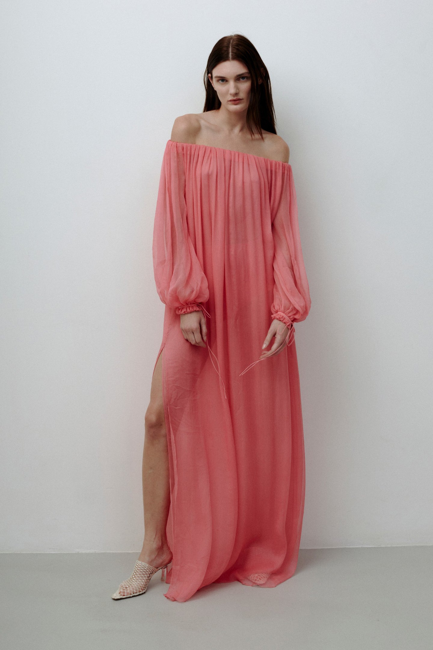 Model in pink Milani dress