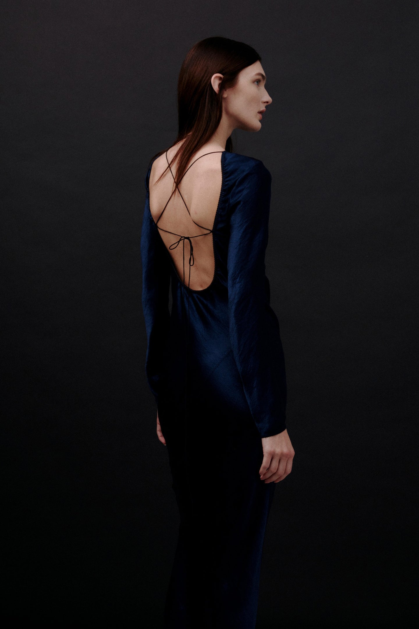 Model in dark blue Deborah dress