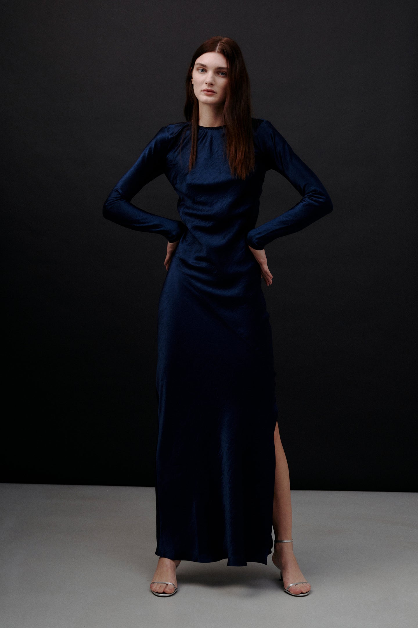 Model in dark blue Deborah dress