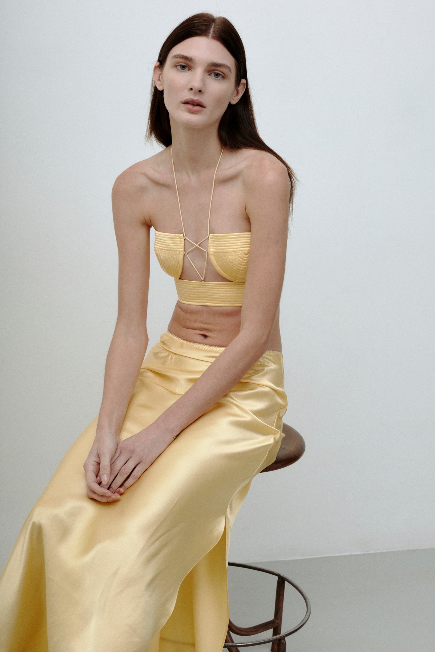 Model in yellow Janiyah skirt